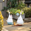 Metal Duck Holding Flower Statuary